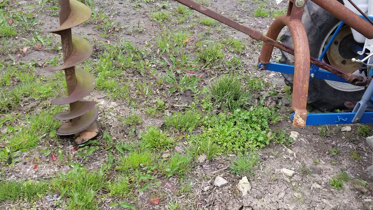 Post hole digger in ground operation on rocky soil YouTube