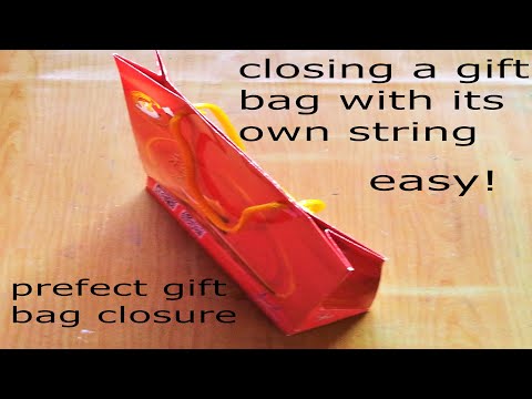easy! closing a gift bag with its own string/ perfect gift bag closure/close gift bag with
