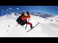 Rideup by kite on Pischahorn ( mountain )and Speedflying down by kite  / snowkiting