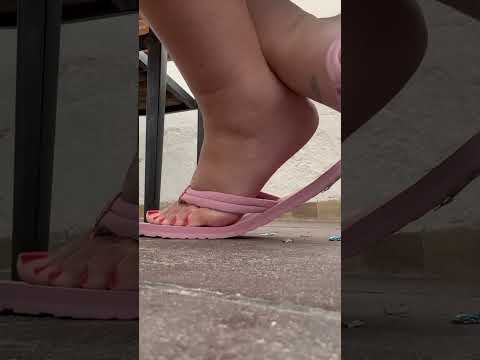 Pink flip flops shaking in public