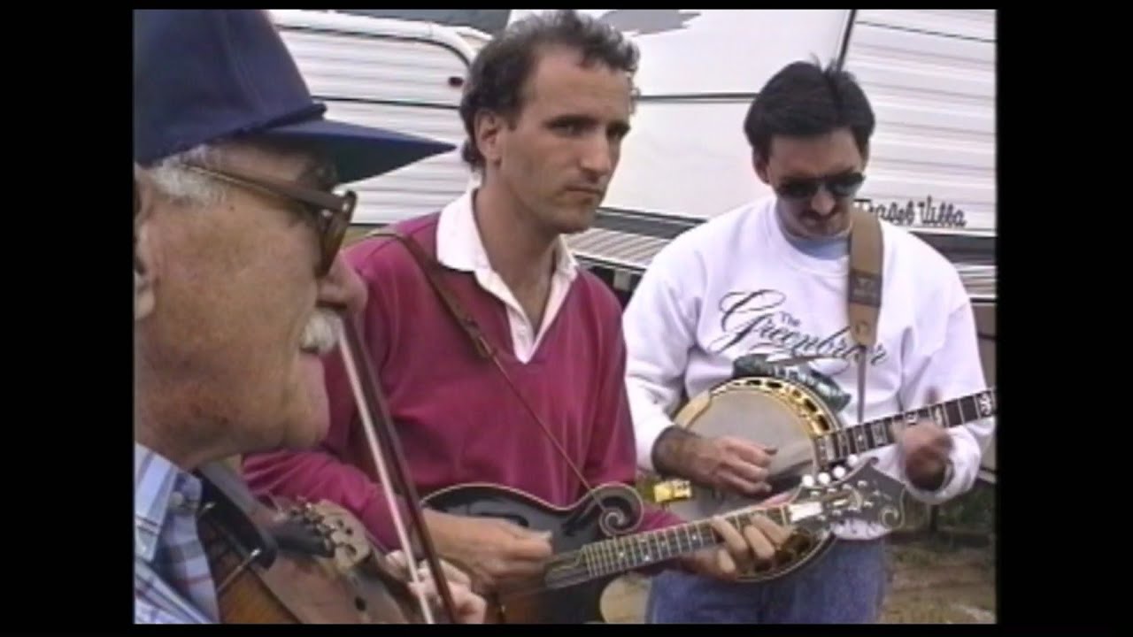 A Bluegrass Session on the Main Street of Felts Park at the Galax Fiddlers Convention, 1991.