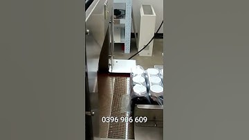 Máy xếp lốc co màng chai tự động