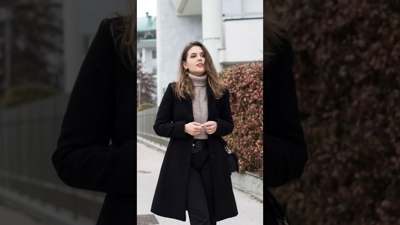 A long, neutral-toned trench coat 