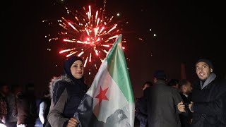 With flags and fireworks, Syrians celebrate one year since fall of al-Assad