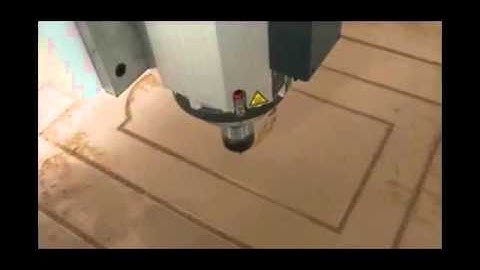 Philicam FLDM1325C linear ATC CNC Router working on MDF door