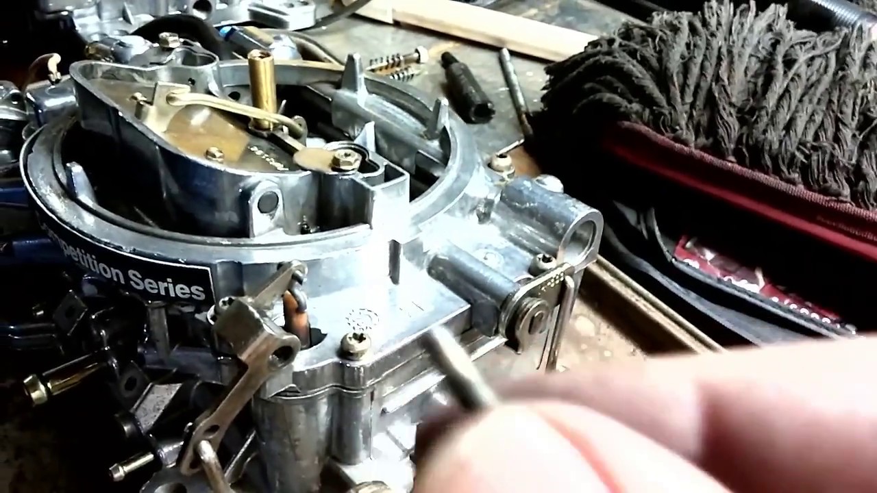 What is involved in a vehicle carburetor rebuild?