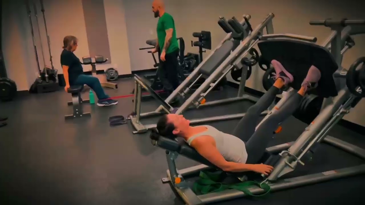 OC Fit hero video thumbnail featuring studio training footage