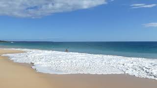 Young man on a skim board at Big Beach Maui