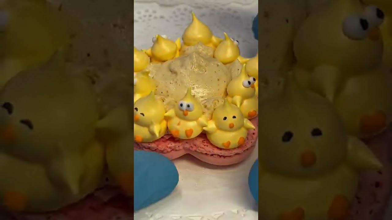 Meringue Chicks snuggle under the flower macaron.