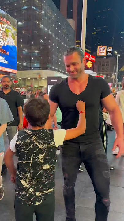 Giga Chad meets little Chad in times square 🗿 #giggachad