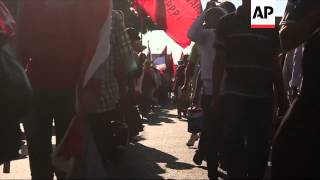 Thousands of farmers and rural workers arrived in Paraguay's capital, Asuncion, on Tuesday after a w screenshot 4