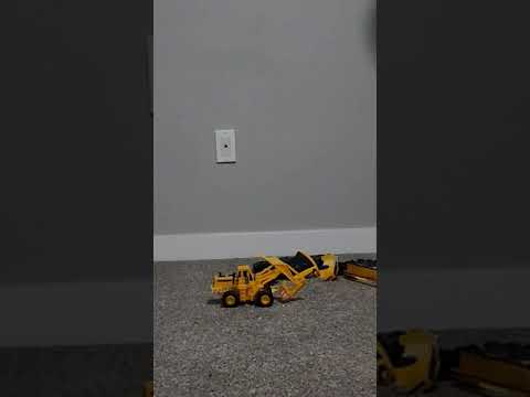 Loader crushed by wedges. Full video coming soon #toycrushedbywedges #crushexperiment #asmrcrush