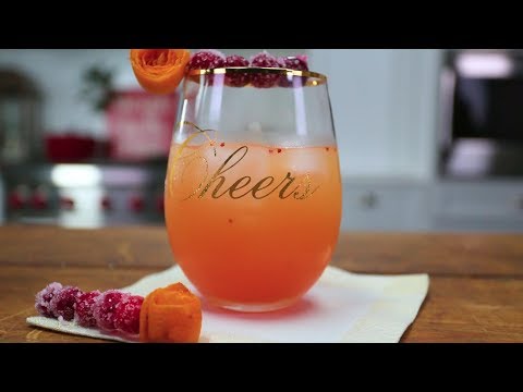 cranberry-orange-mocktail-with-sparkling-cranberries-|-southern-living
