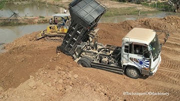 Incredible 5 Ton Dump Truck Unloading Soil With Komatsu D20P Dozer Filling Land In Village