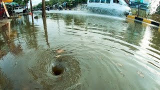 Drain Massive Flood Rain On Street Road After Heavy Rain