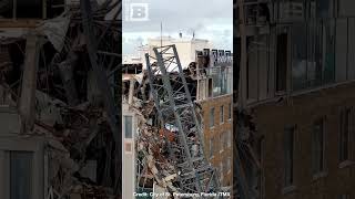 Milton's Wrath: Toppled Crane Smashes into Building in St. Petersburg, FL Milton's Wrath: Toppled Crane Smashes into Building in St. Petersburg, FL