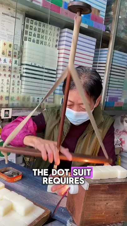Last Female Mahjong Carver in Hong Kong hand carved and hand paints mahjong tiles.
