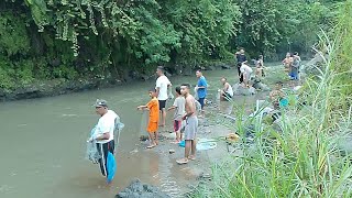 Fishermen Catch Fish in the River Using Nets