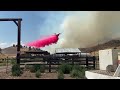 Plane drops retardant at Rowe Creek Complex West Zone