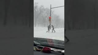 Two types of people in #canada during a #snowstorm the ones who #ski and the ones who wear shorts