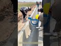 Scoring Concrete Channels: How Rural Workers Cut Expansion Joints in U‑Shaped Irrigation Canals