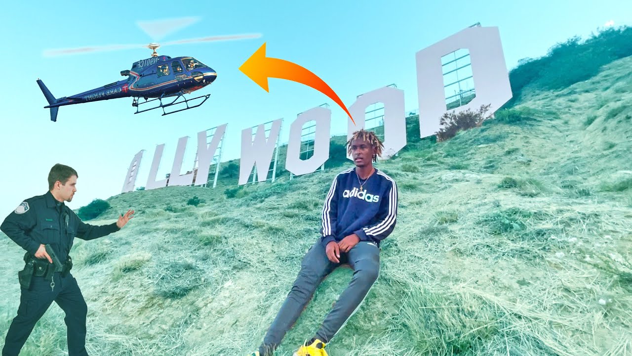 I TOUCHED HOLLYWOOD SIGN AND GOT HELICOPTER CHASED *NOT CLICKBAIT*😱👮‍♀️🚁