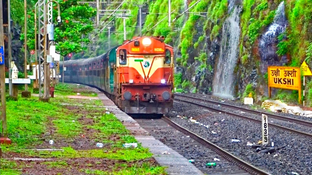 crossing trains in Beautiful Waterfalls in Ukshi Station in Konkan railway