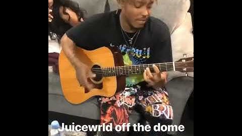 Thumbnail of Juice wrld playing a guitar