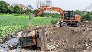 Saddened by the Scene of the Backhoe Falling Down in the Deep Mud