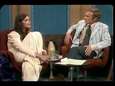 Margot Kidder reads a quote from Joan Garrity