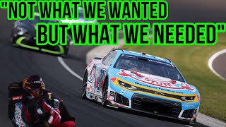Shane van Gisbergen drives into grass while adjusting steering wheel, later finishes 16th at Indy