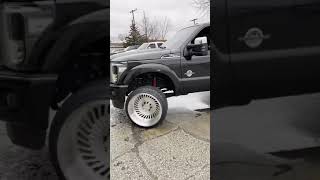 We just installed 24x14 Brushed BCR wheels wrapped in 305/35/24 Nitto Terra Grapplers on this F-250