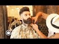 Getting a beard trim at the barbershop  carlos costa