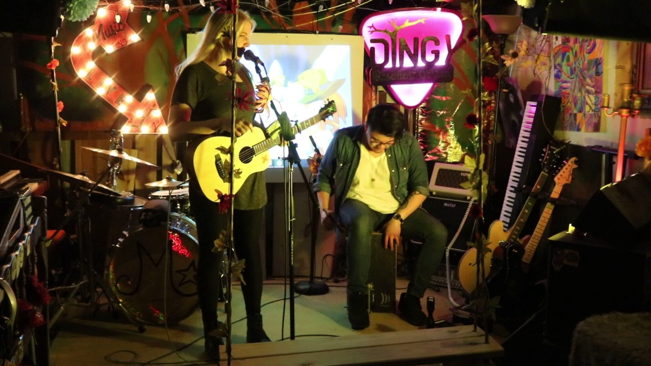 Anita Schulz Performing at the Dingy Basement Garden Concert.