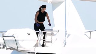 Eva Longoria does a unique workout as she is seen jumping on a trampoline while on a yacht in Miami.