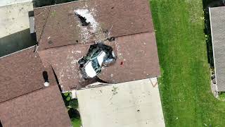 WEB Extra: Drone video of car that went through roof