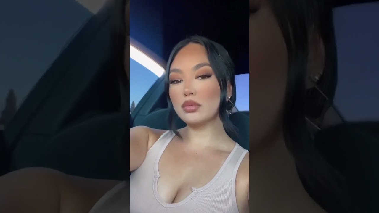 Glamorous Woman Driving: Chic and Confident