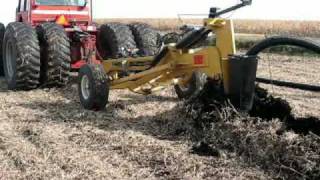 Installing Prinsco farm drainage tile  with the Gold Digger tile plow