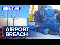 Security breach at sydney international airport after man found on tarmac  9 news australia