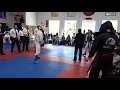 Grand Championship: Black Belt fight 2 (my student Ben white helmet)