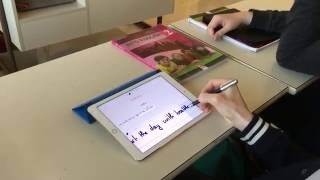 Student writes on the iPad with Notability
