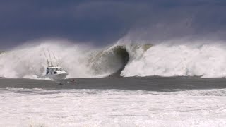 SURFING HUGE WAVES IN WAIKIKI!!! (BOAT GETS CAUGHT INSIDE)