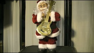 Rocking Guitar playing Santa Claus