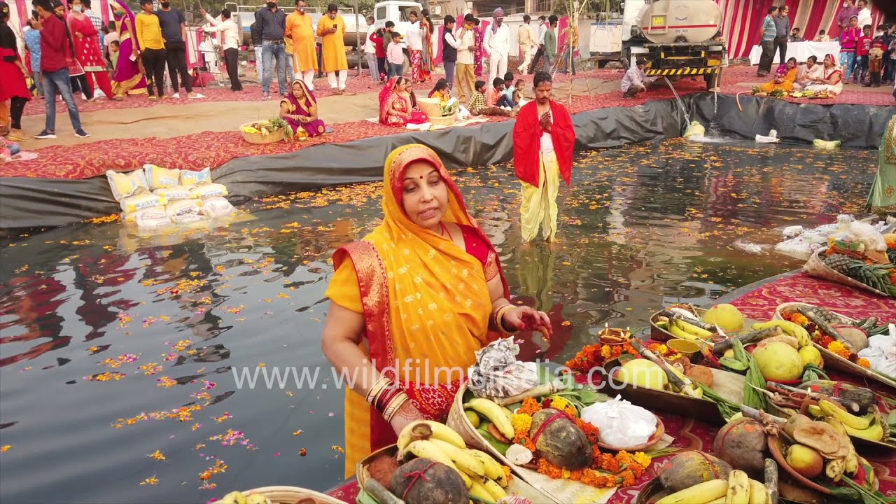 Women devotees wade into dirty Yamuna river waters at Chhath Puja in Delhi The power of faith