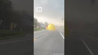 What the DUCK?! Giant Inflatable Duck Bounces Across Road