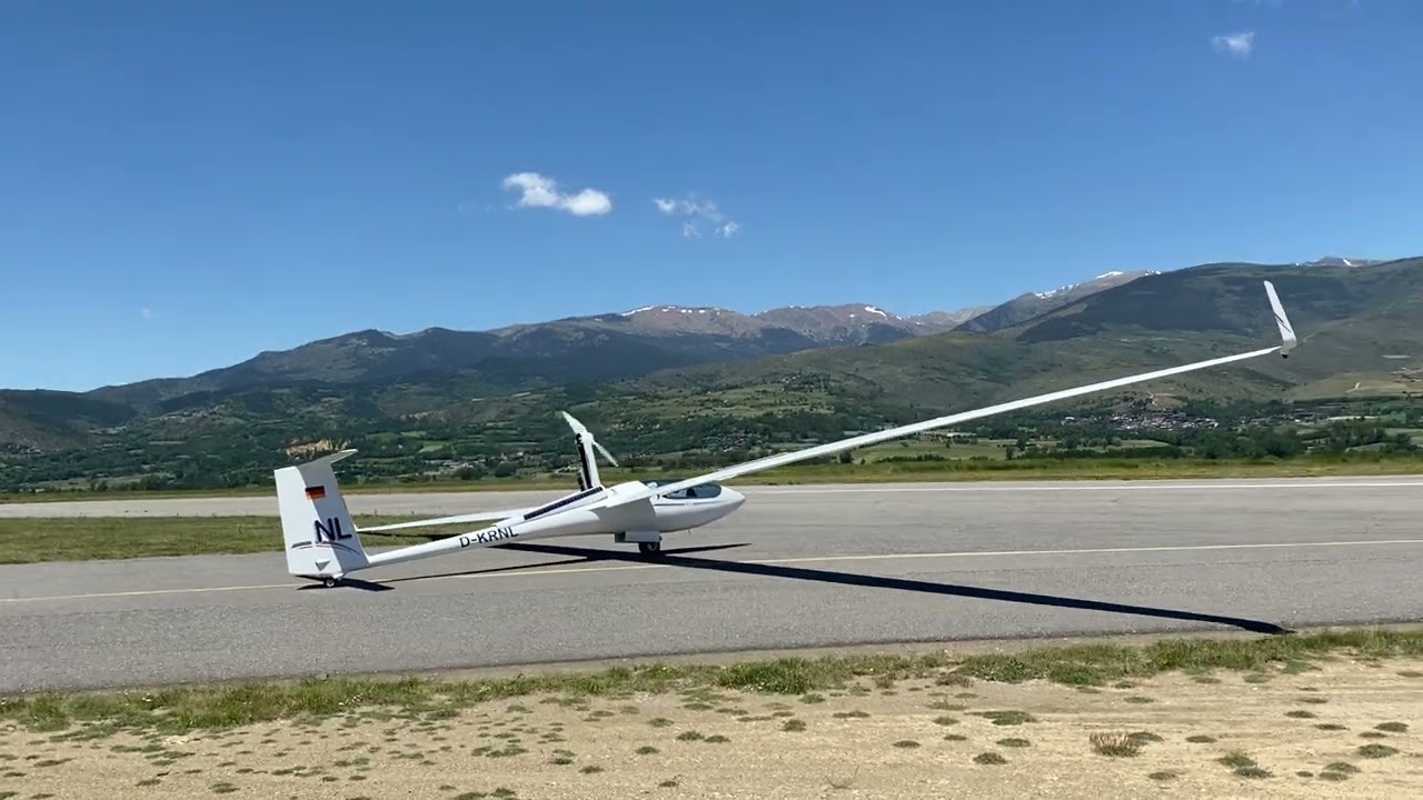 Motor Glider Schleicher ASH-31Mi taking off from Pyrenees