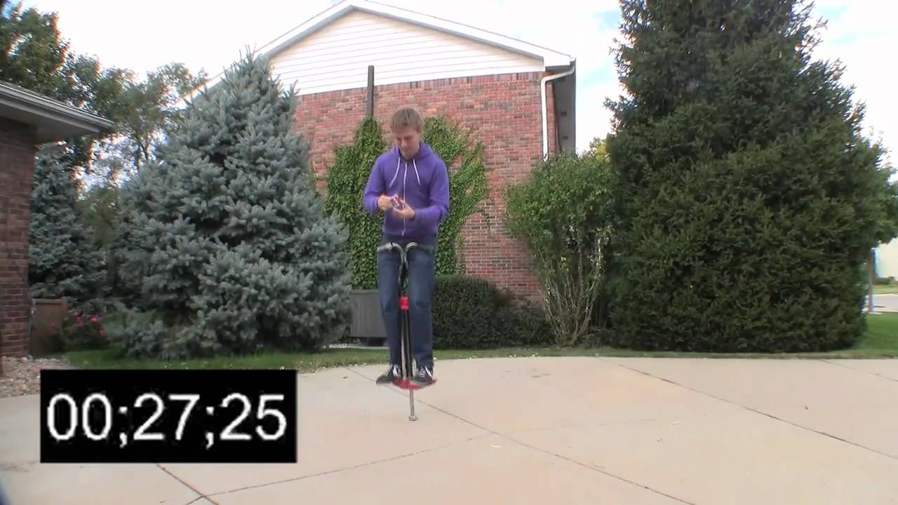 Rubik's Cube Solved WHILE POGO STICKING! - Dan Brown solves a Rubik's Cube in less than a minute while pogo sticking! 