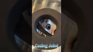 casing joint with bolt for segmental casing liner