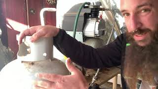 Removing old gases from gas bottles to compress Biogas.
