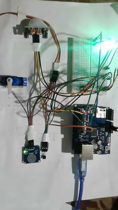 Automatic door opening system using Arduino according to temperature ...
